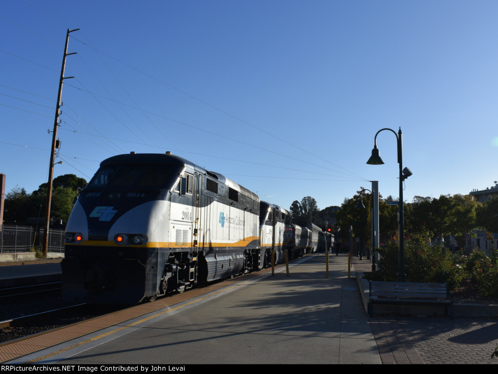 Amtrak California F59PHI locomotives # 2014 and 2004 push Train # 710 out of Martinez Station